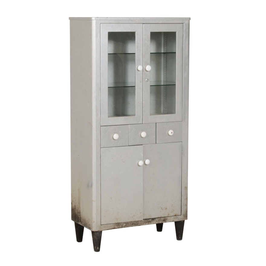 tall metal cabinet with glass doors