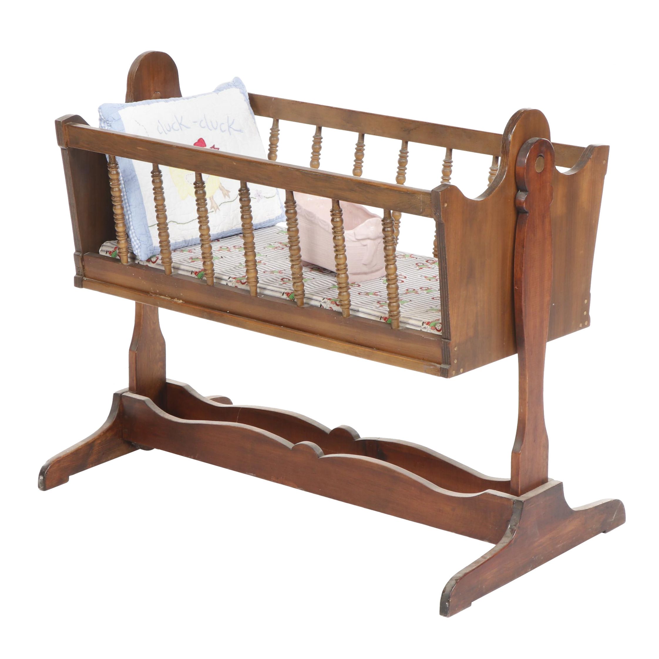 vintage wooden doll cradle