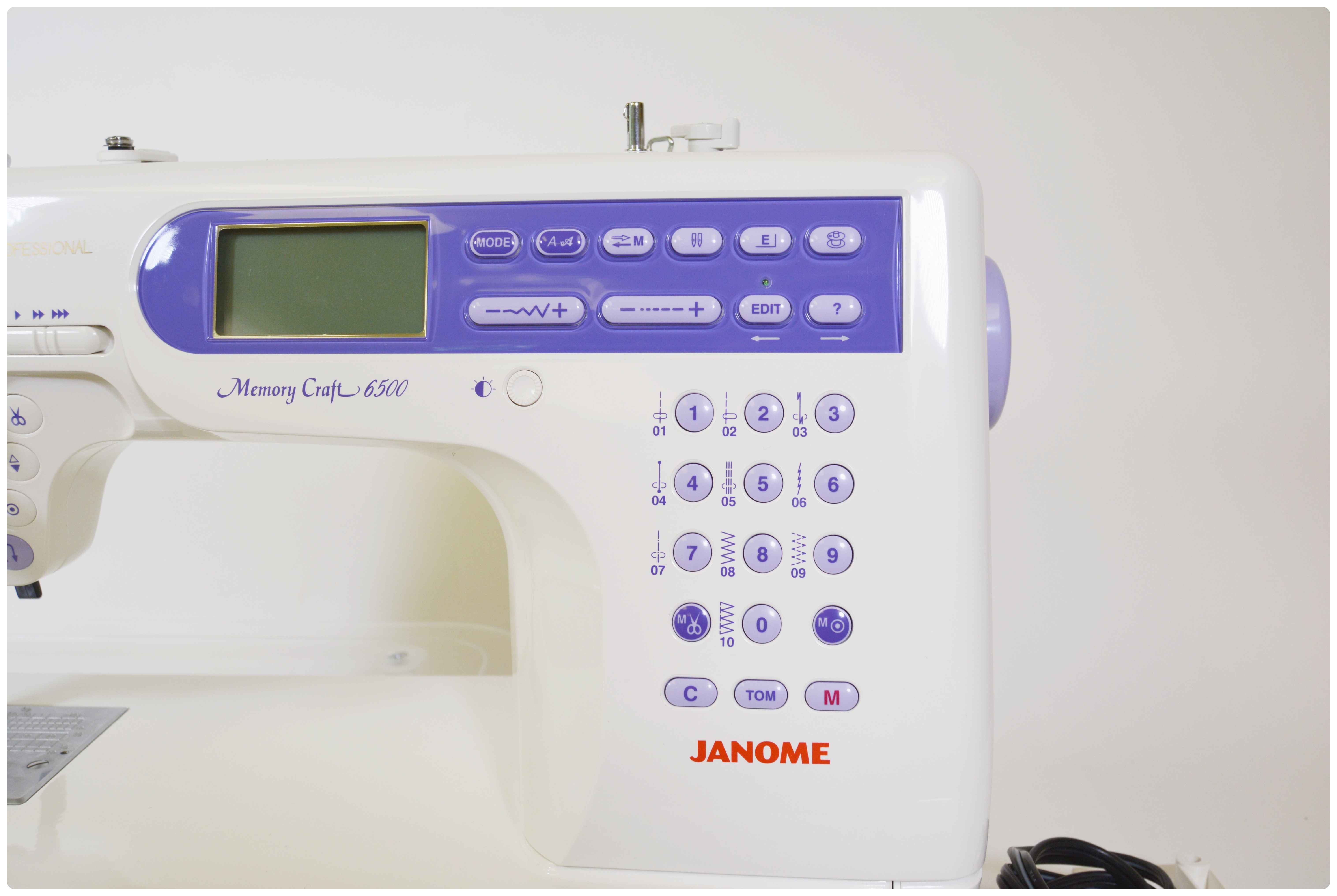 Janome Memory Craft 6500 Professional Sewing Machine and Extension