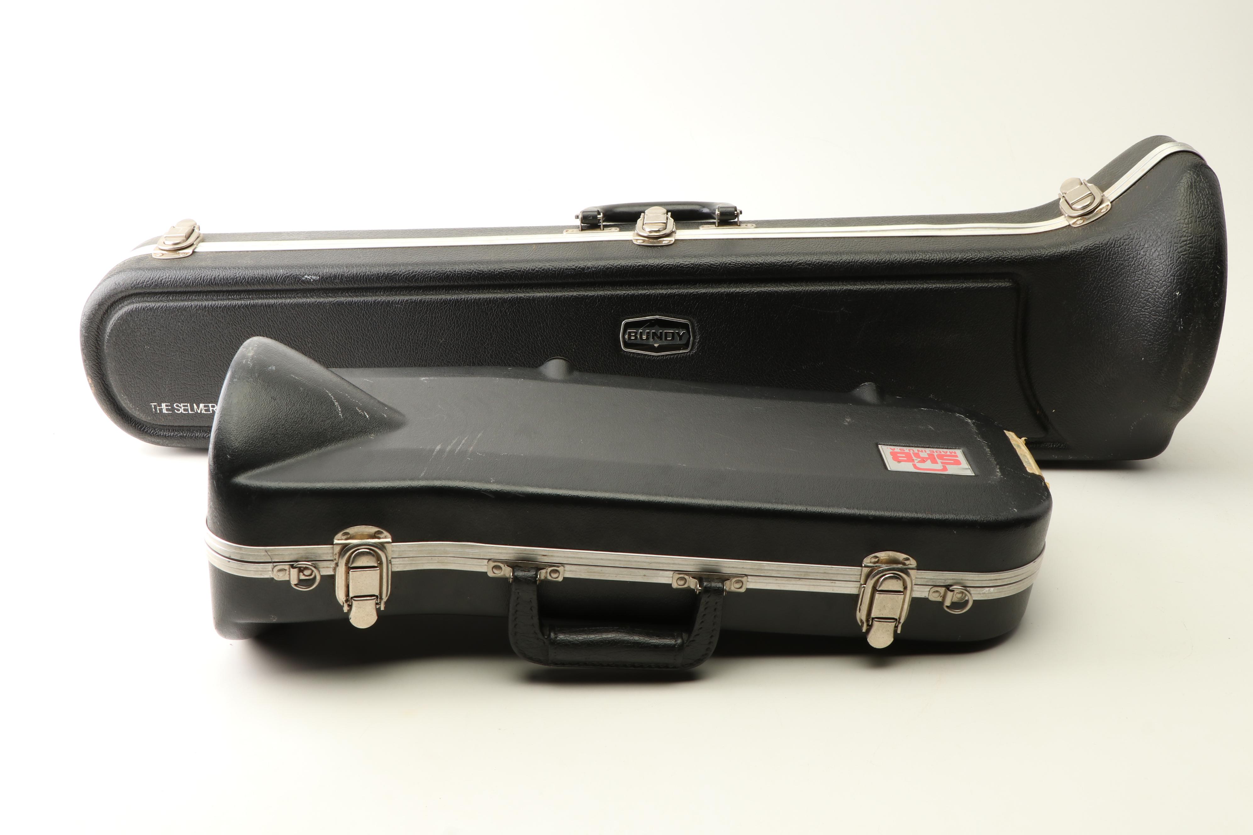 Bundy Student Trombone and King Student Trumpet in Hard Acrylic Cases