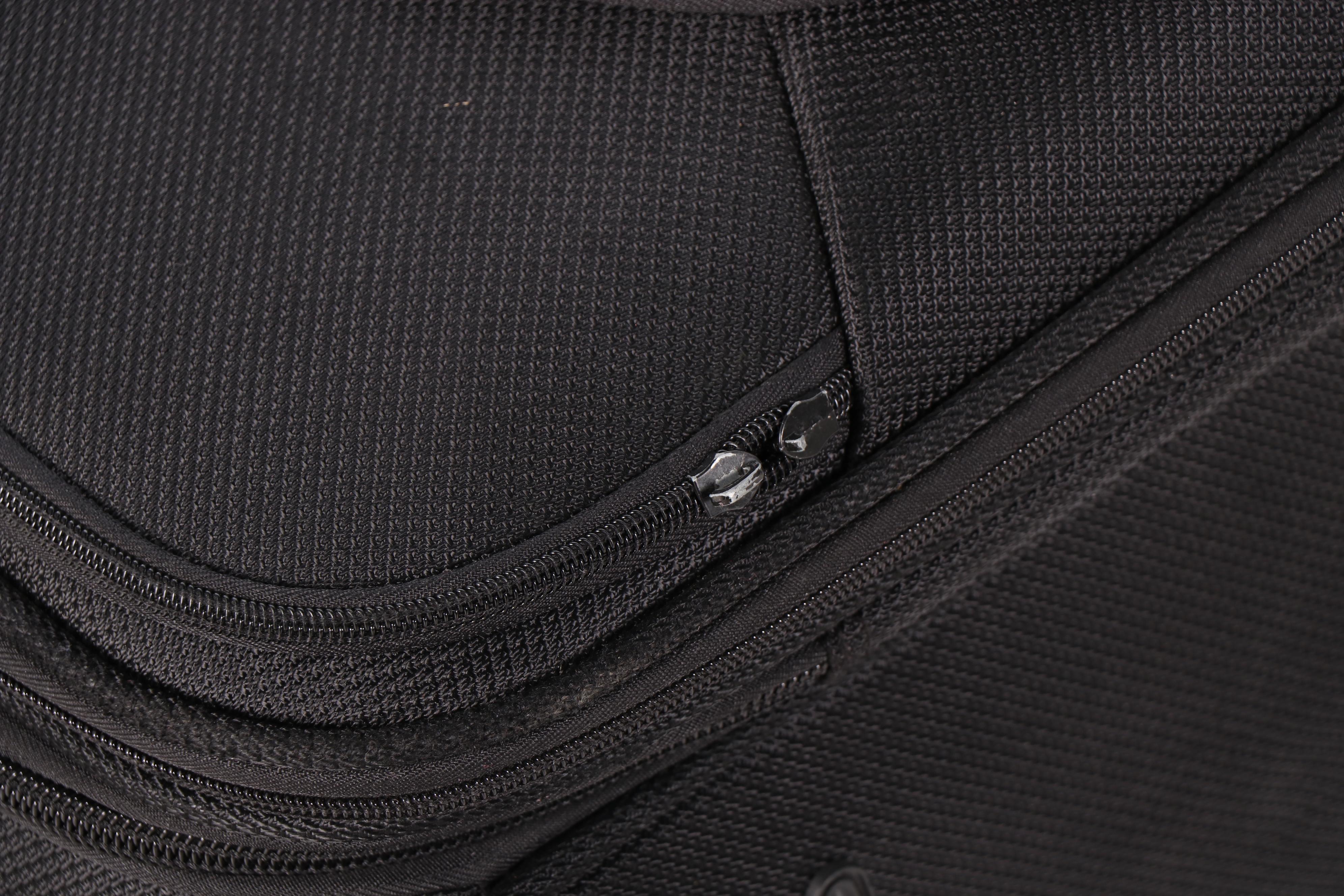 Eddie Bauer and CP Black Nylon Rolling Suitcases EBTH