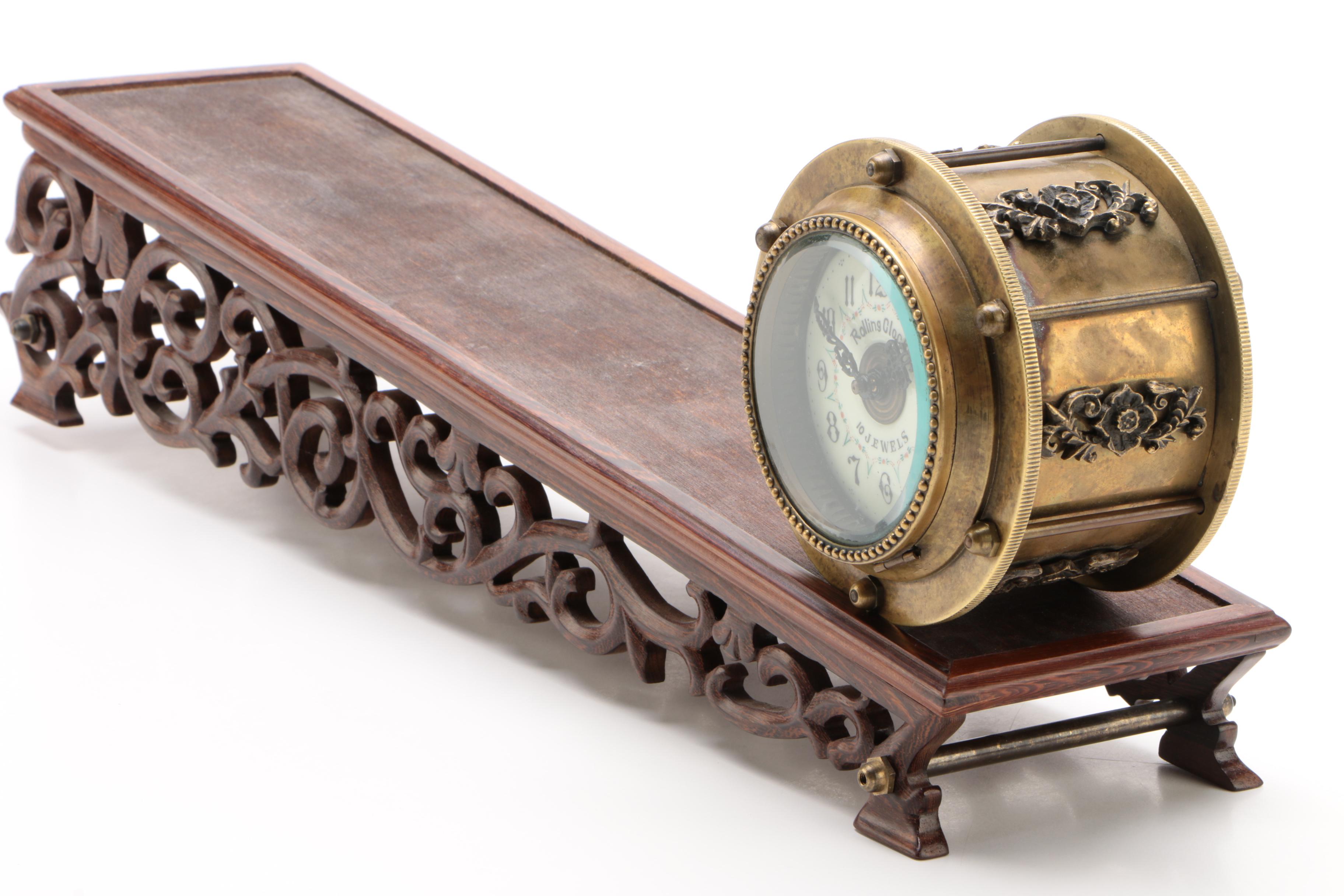 10 Jewel Rolling Drum Incline Plane Clock With Reticulated Carved Wood