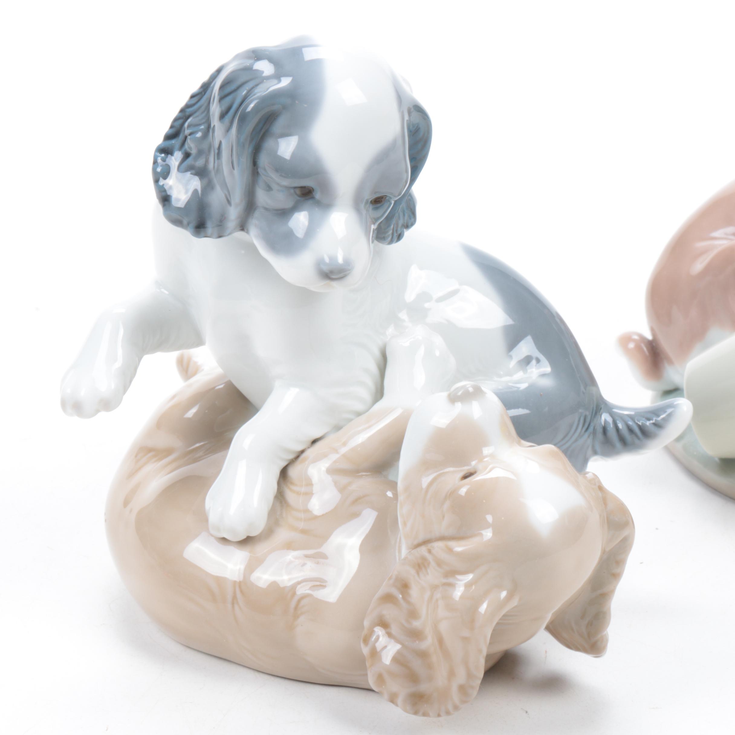 Lladró "It Wasn't Me" and NAO by Lladró "Two Dogs Playing" Porcelain