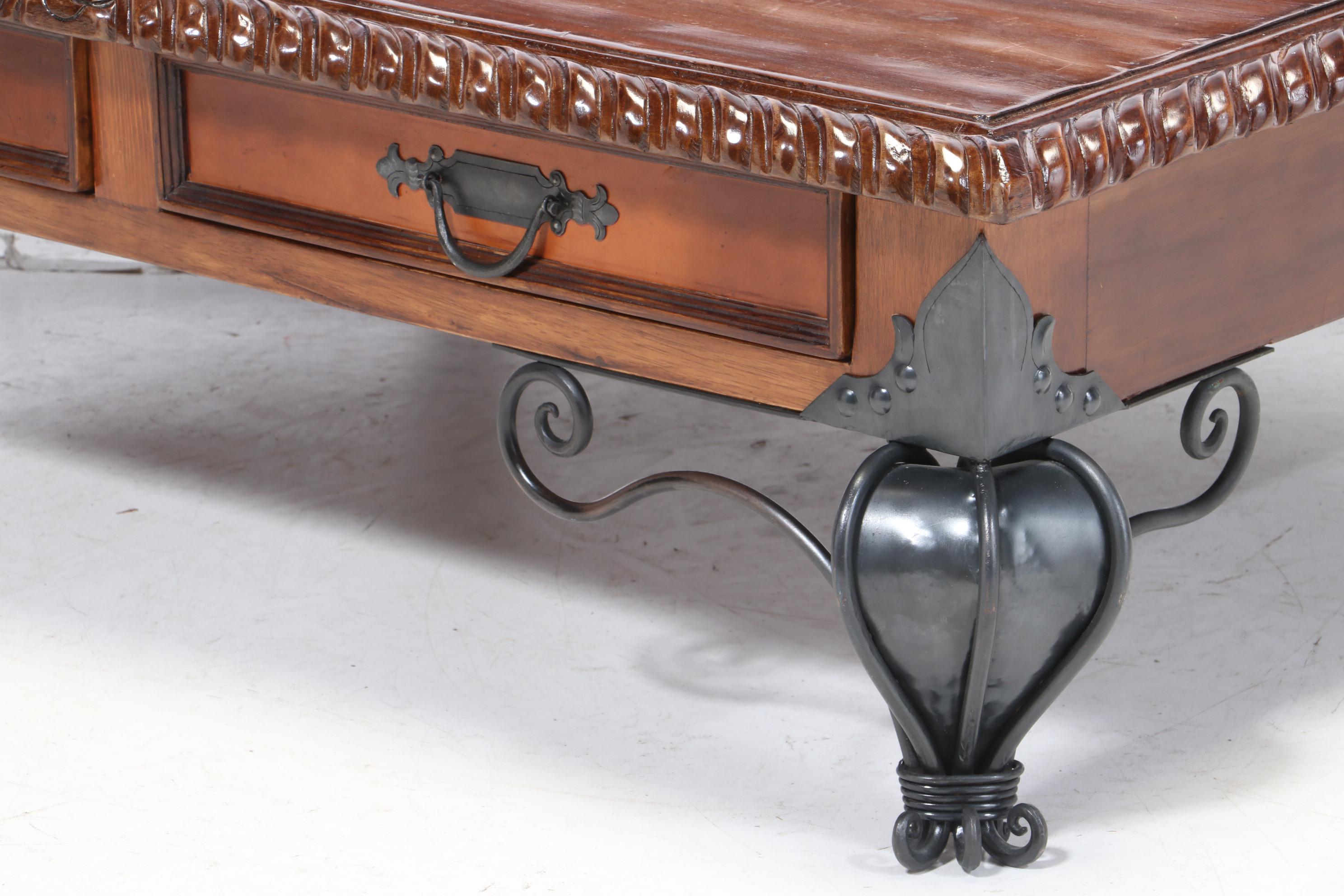 Artisan Carved Reclaimed Wood Coffee Table with Wrought Iron Legs