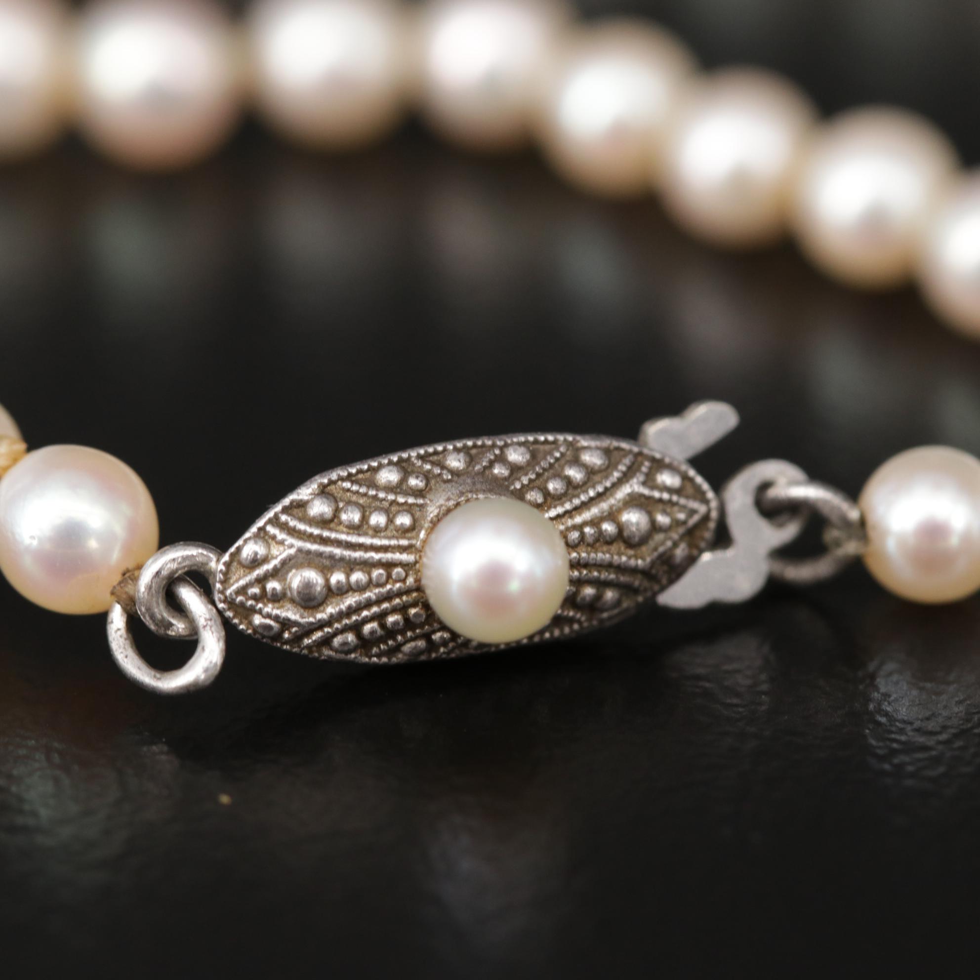 Graduated Strand of Mikimoto Pearls with Sterling Silver Clasp EBTH