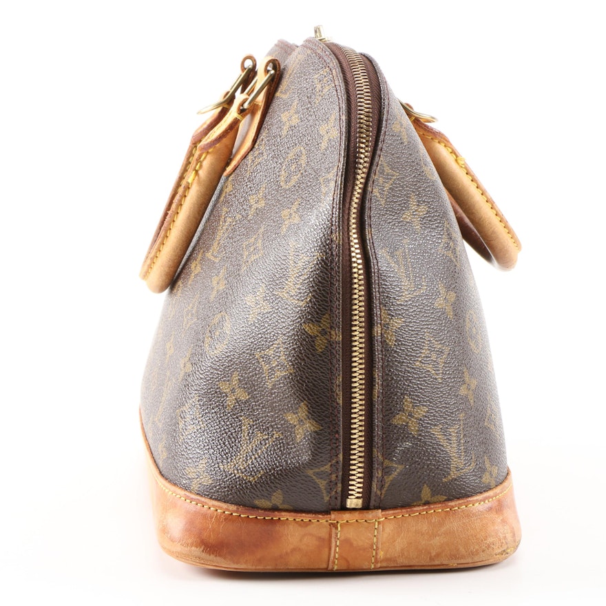 Louis Vuitton Alma Top Handle Bag in Monogram Canvas and Vachetta Leather | EBTH