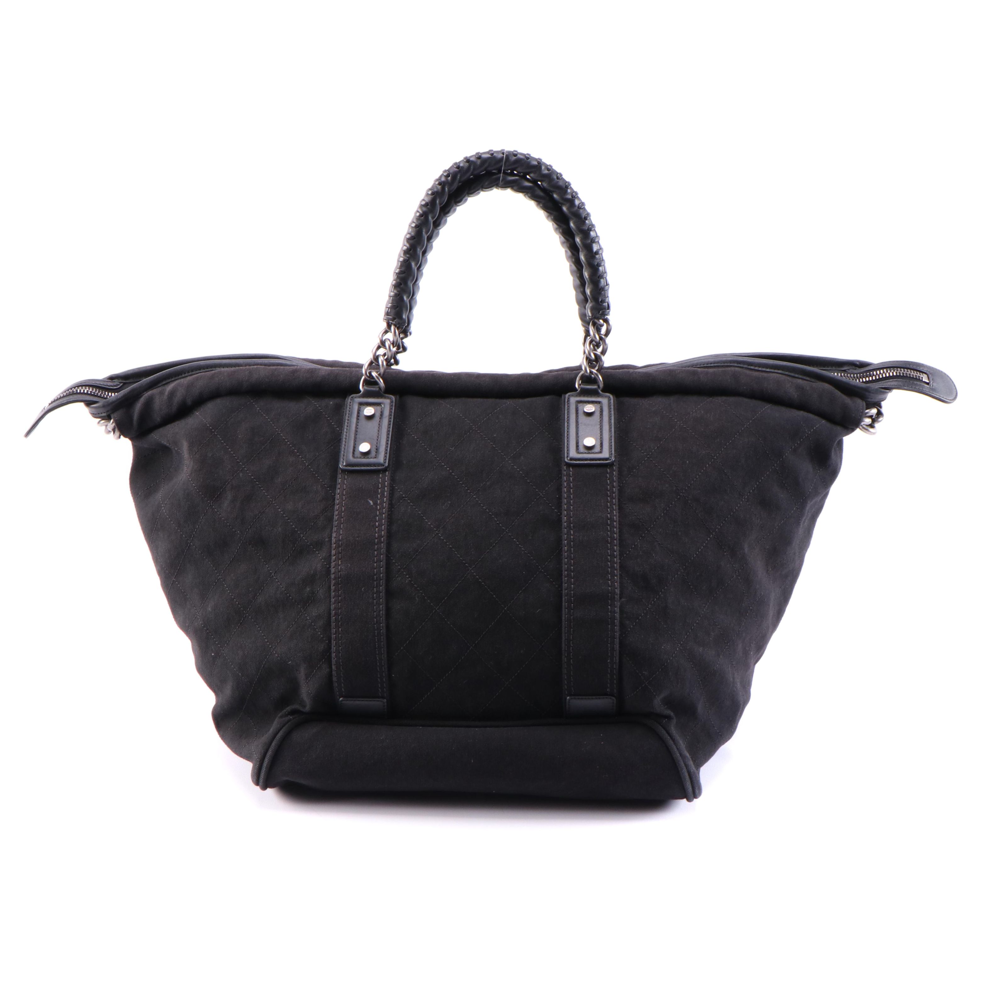 black quilted weekender bag