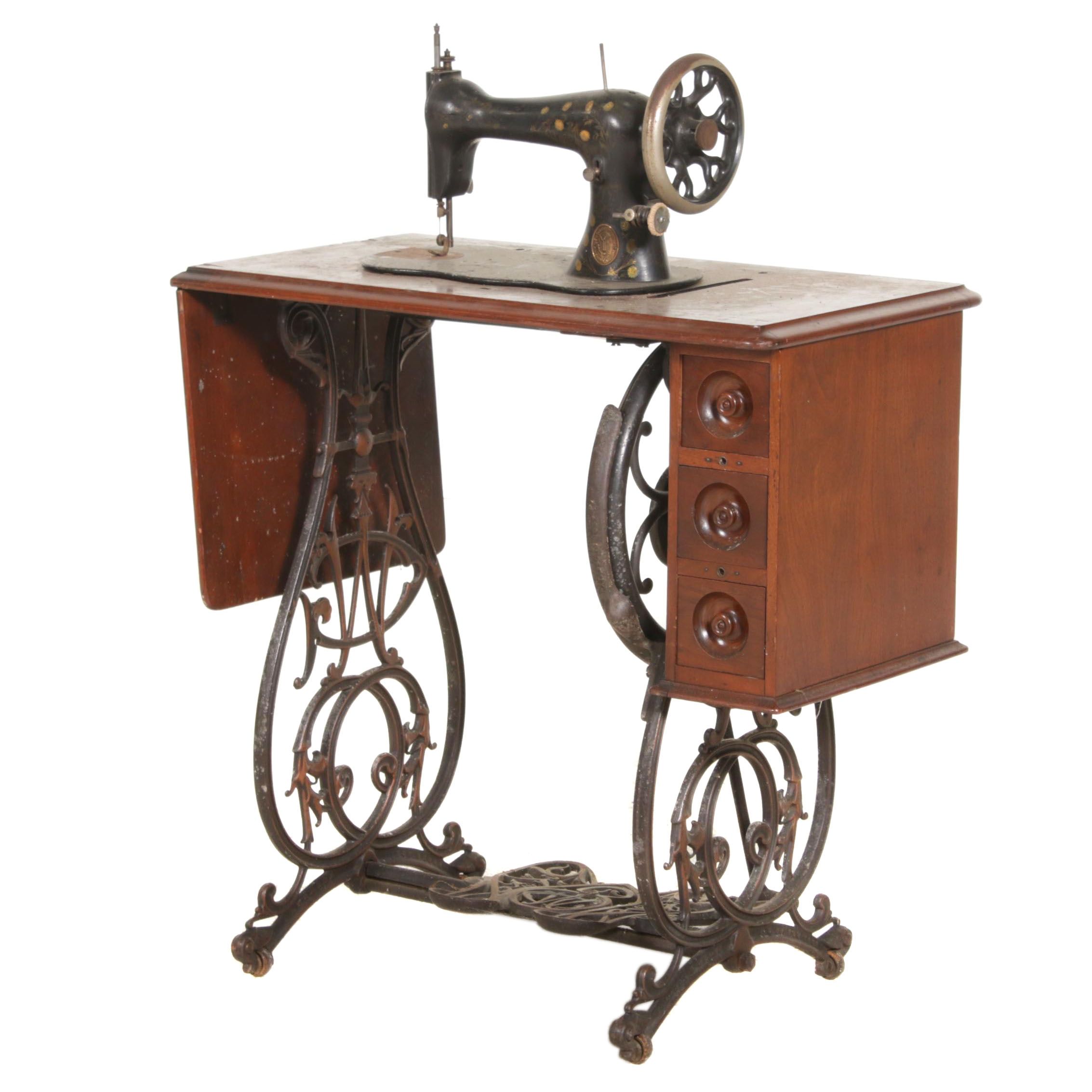 Oak and Cast Iron Singer Sewing Machine and Table, circa 1900 EBTH