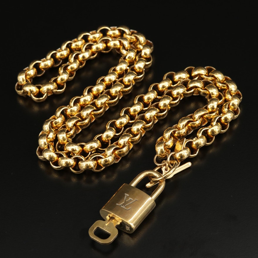 Louis Vuitton Yellow Gold Lock Link Bracelet at 1stDibs