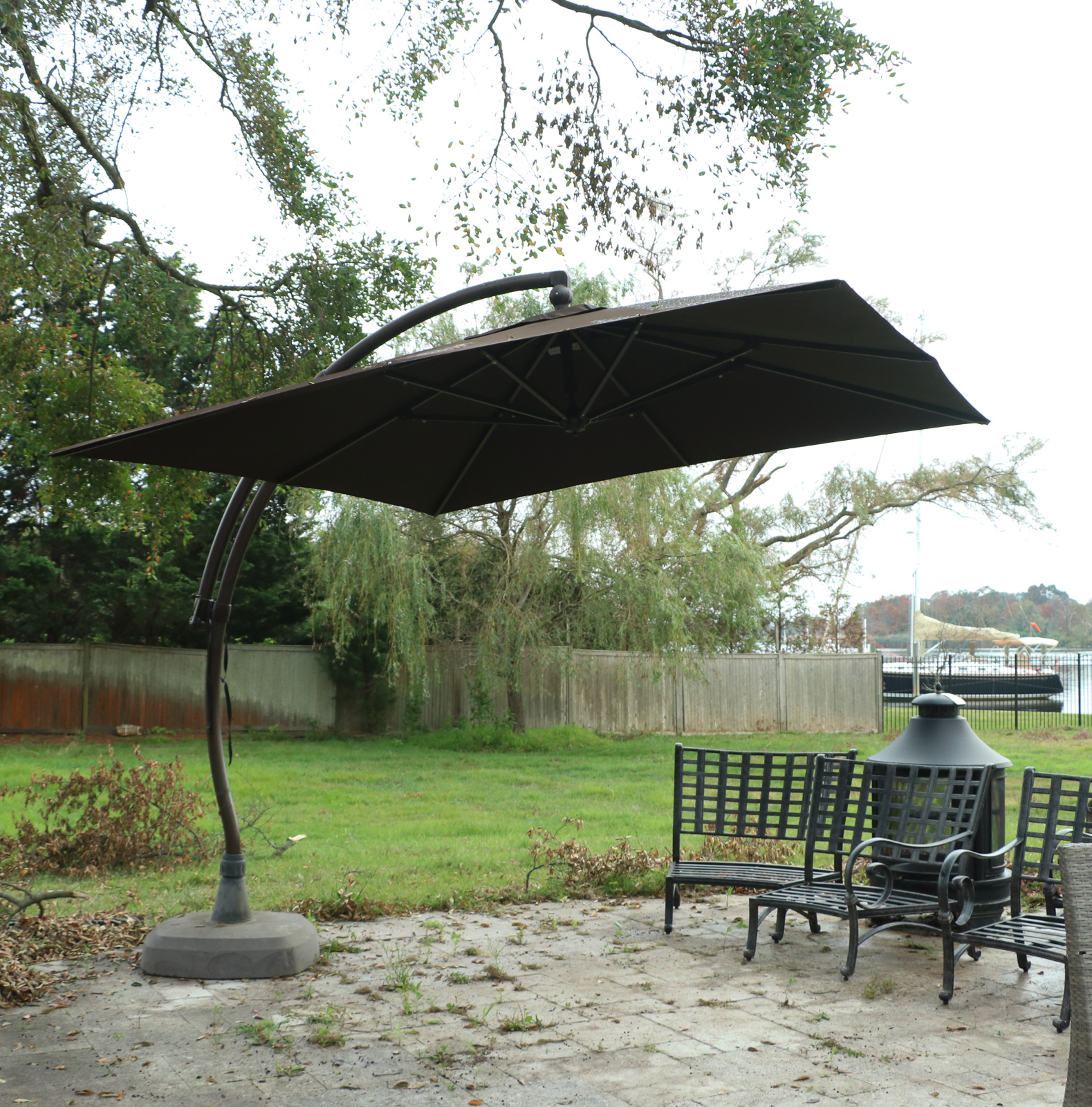 Brown Square Patio Umbrella And Stand Ebth