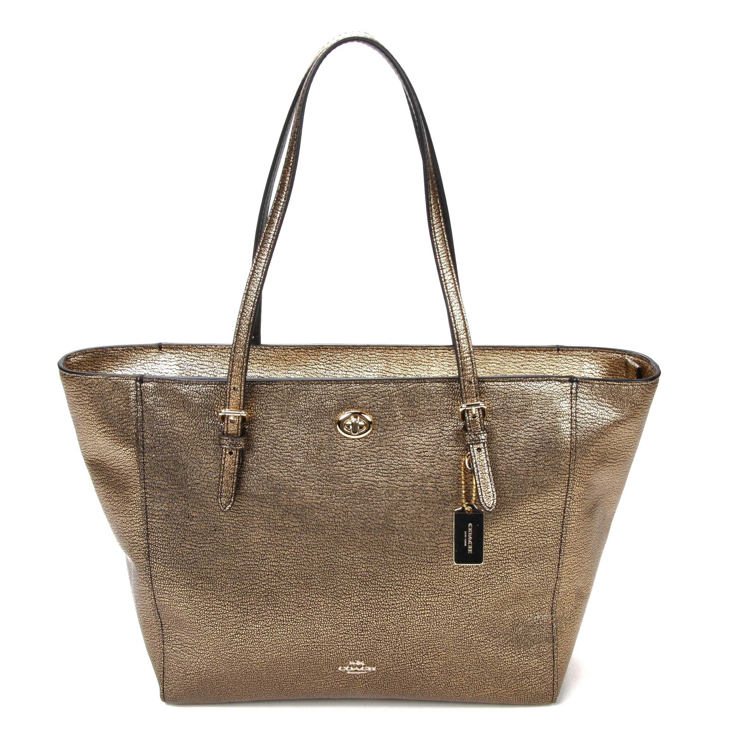 coach gold handbag