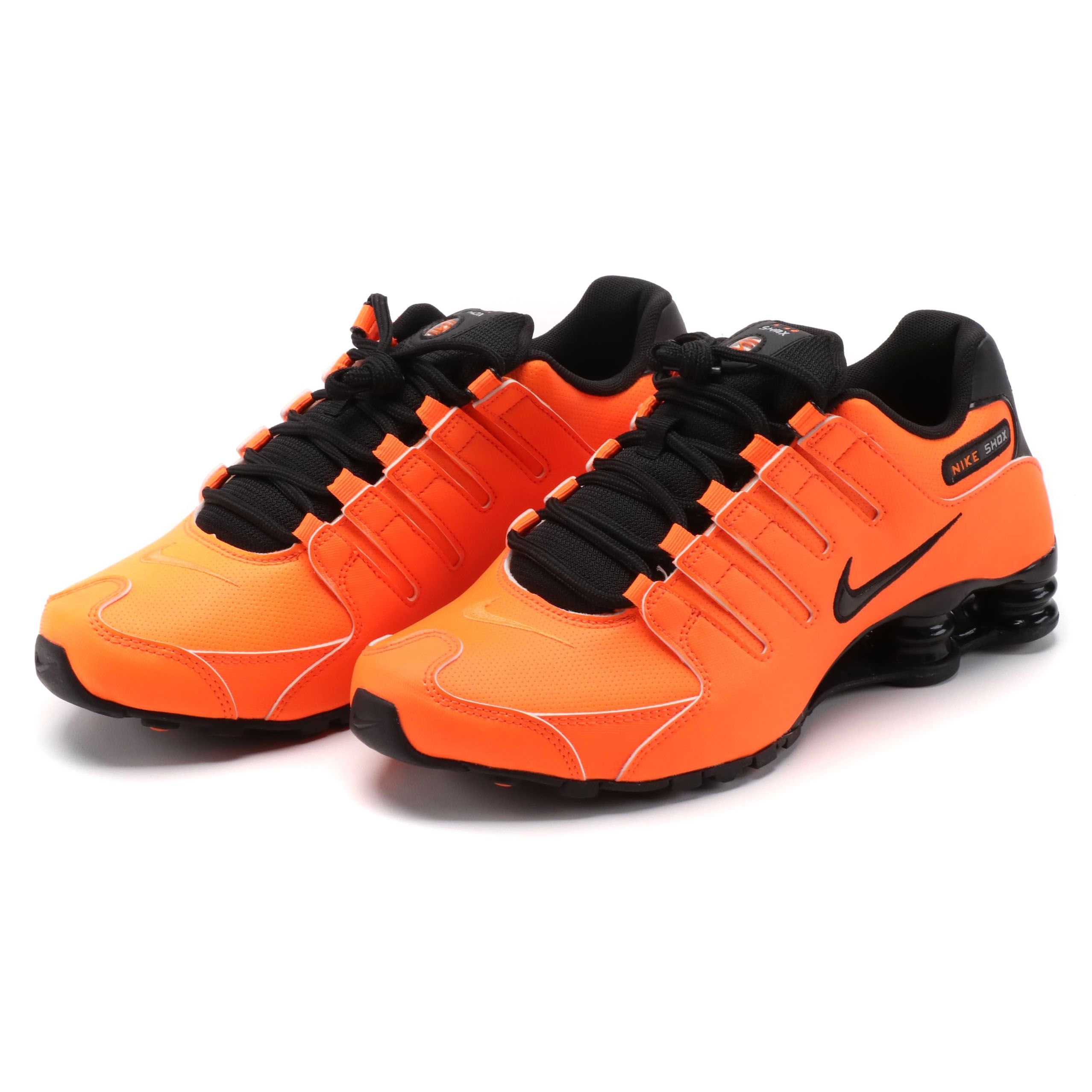 black and orange nike shox