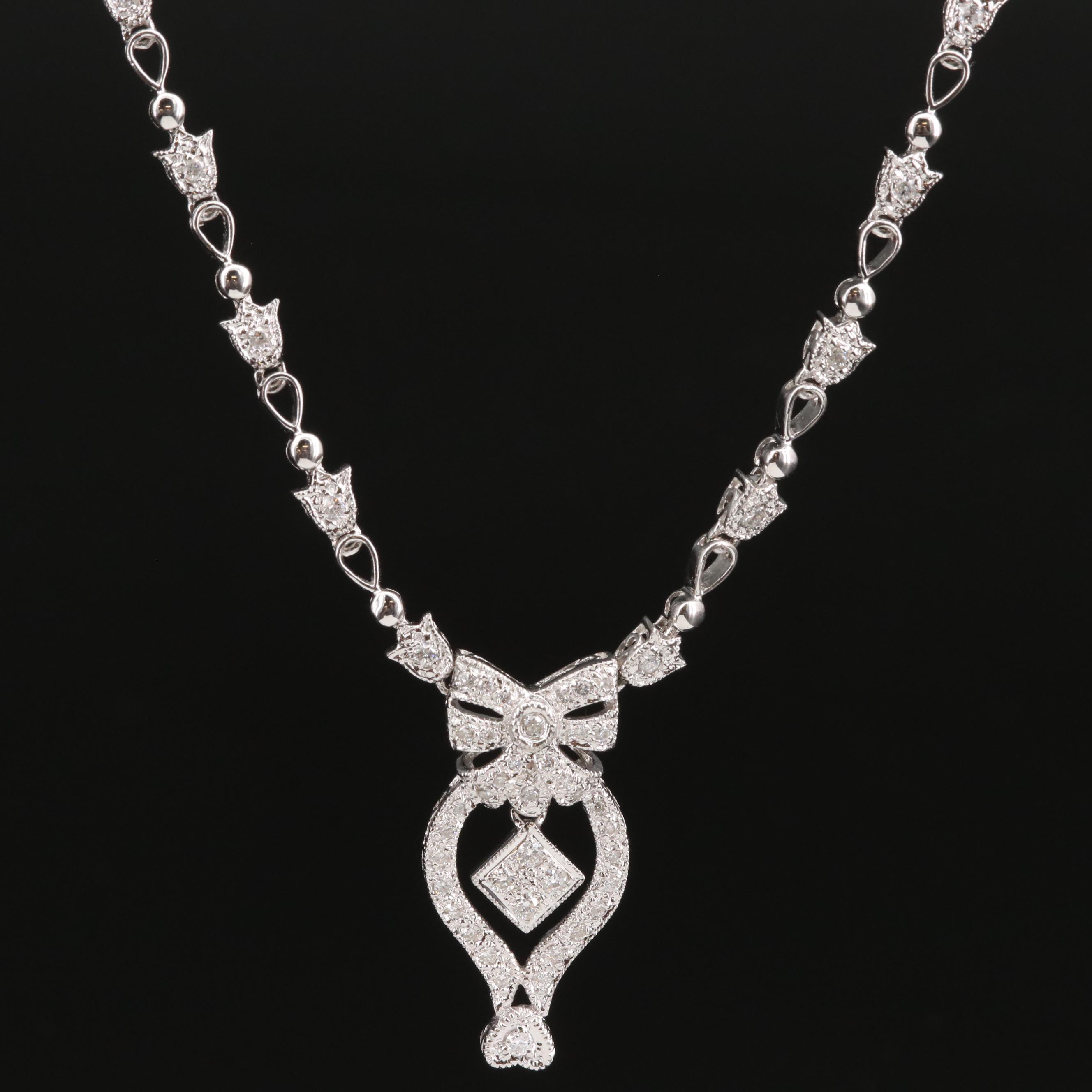 18K Diamond Stationary Pendant Necklace Featuring Bow Design EBTH