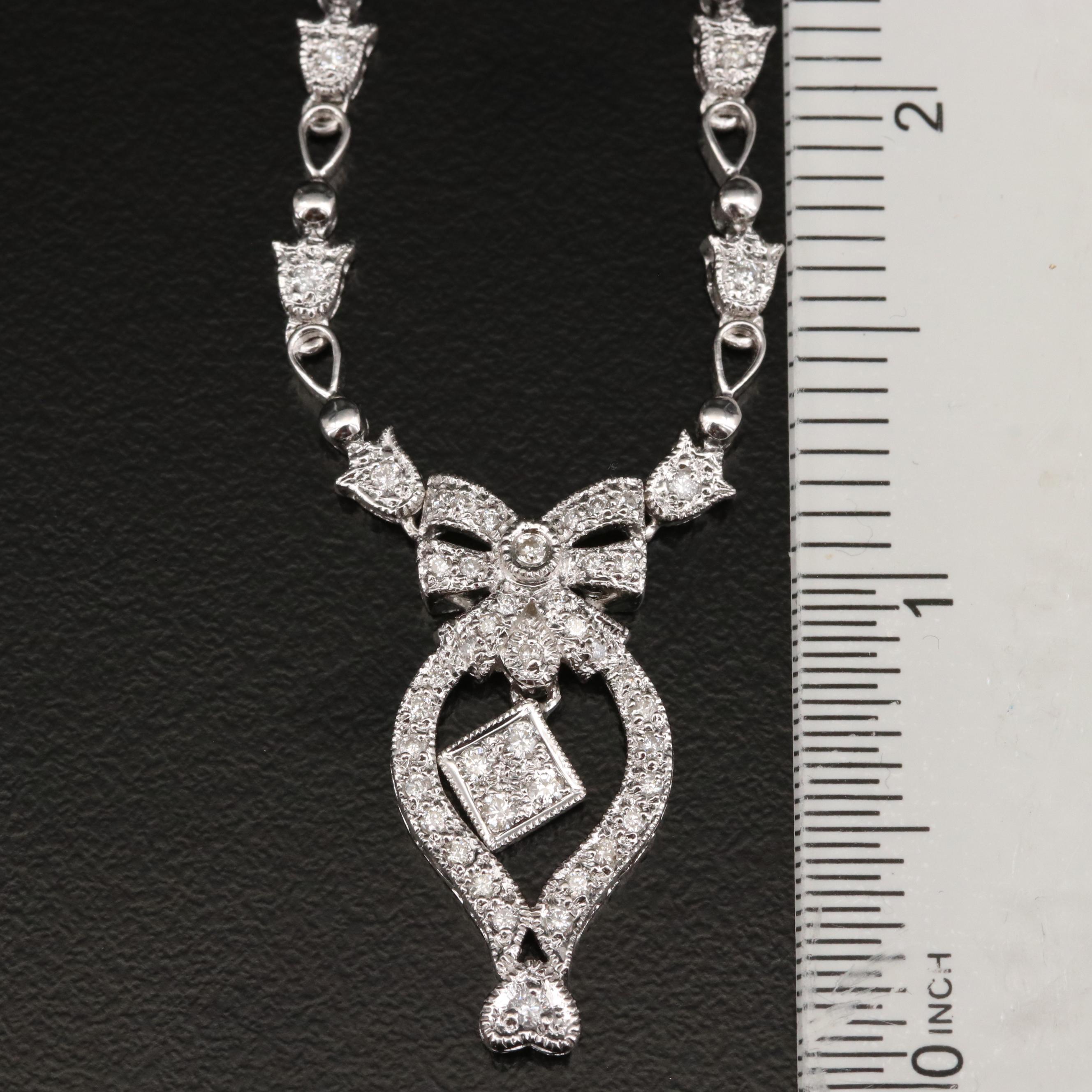 18K Diamond Stationary Pendant Necklace Featuring Bow Design EBTH