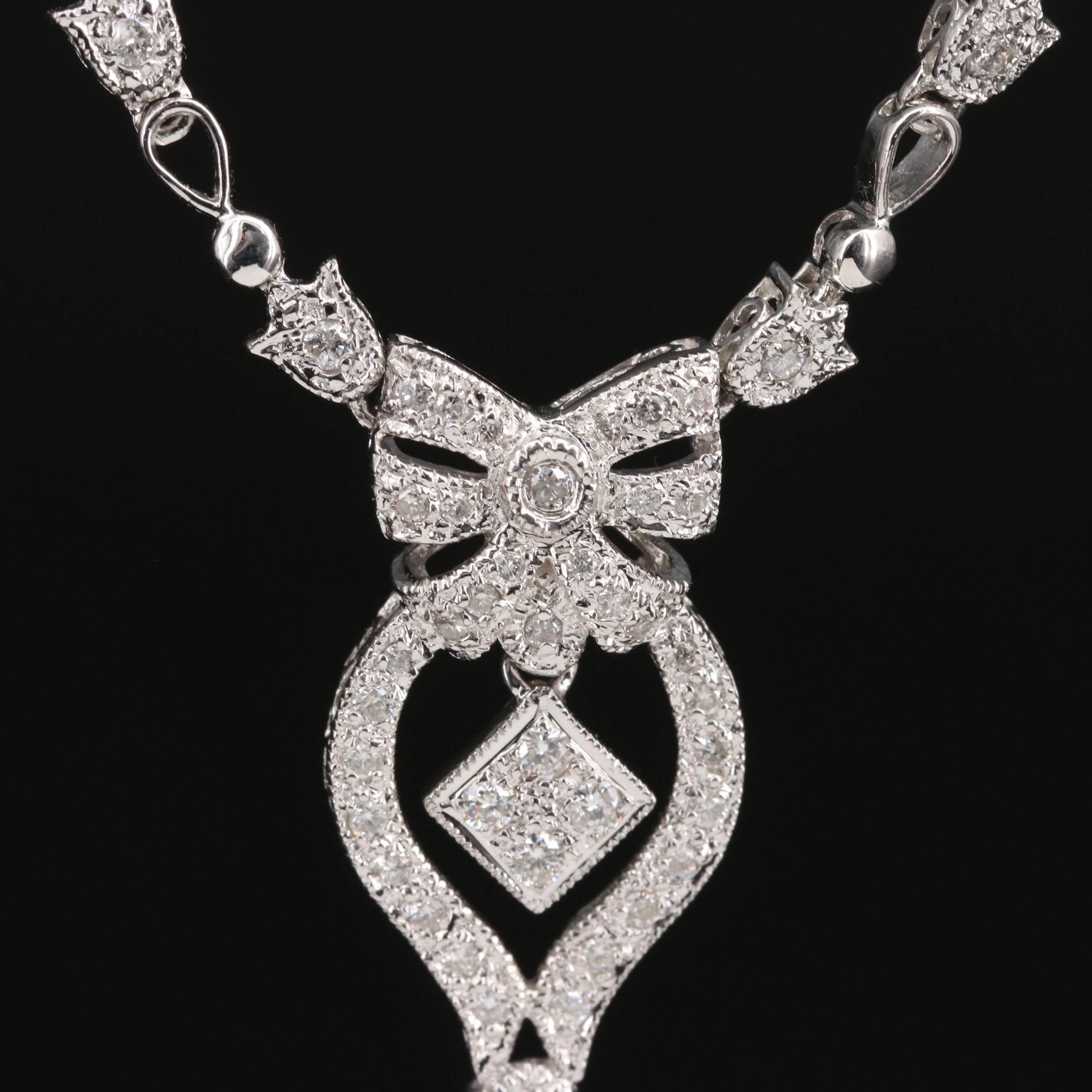 18K Diamond Stationary Pendant Necklace Featuring Bow Design EBTH