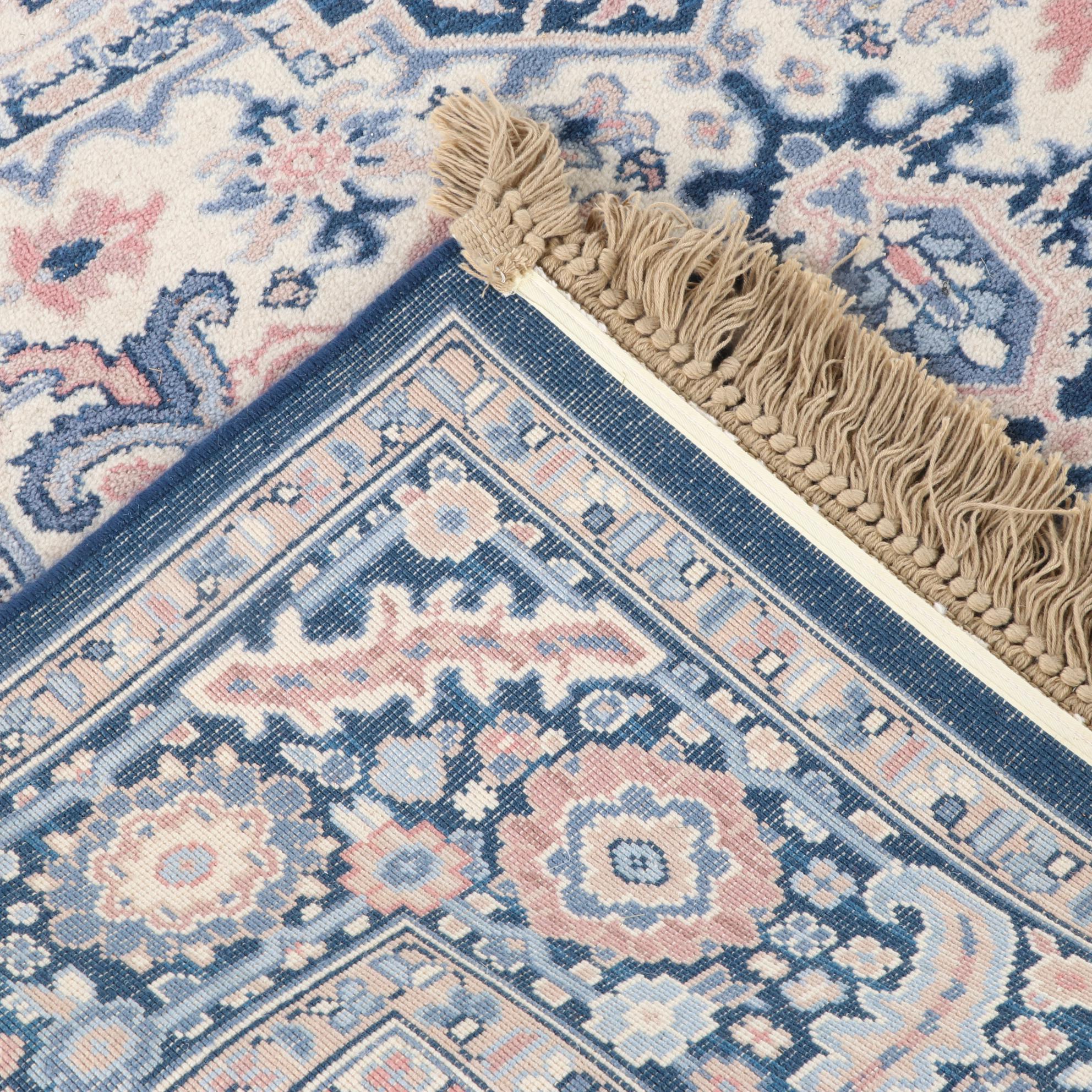 5'9 x 10'0 Machine Made Karastan "Blue Heriz" Wool Area Rug EBTH