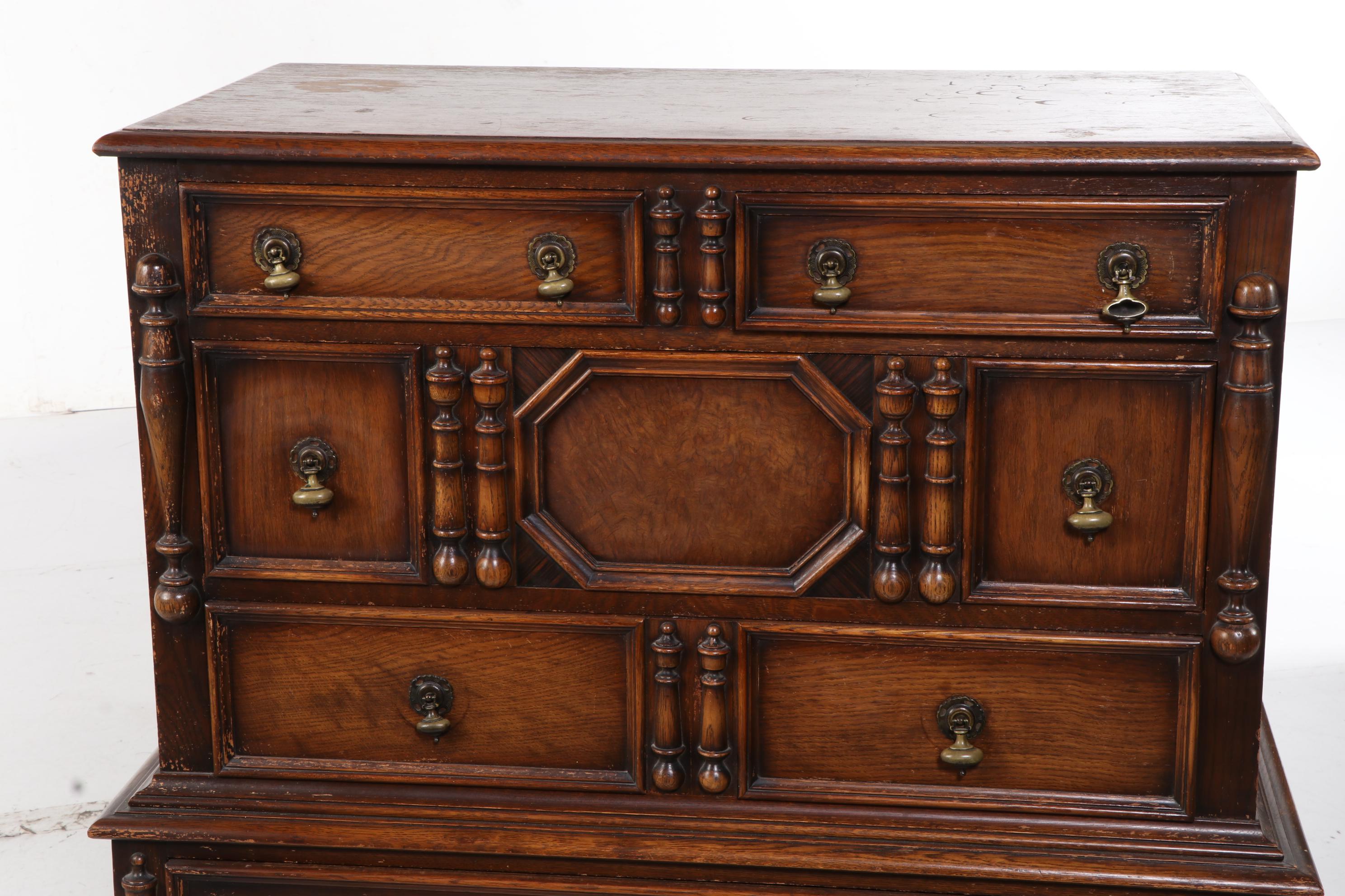American Furniture Co. Jacobean Style Carved Oak FiveDrawer Cheston