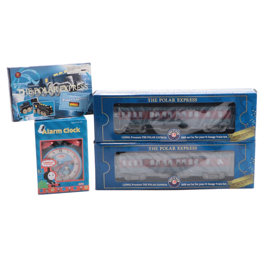 Lionel and Other O Gauge Polar Express Passenger Cars, Toy Train and Alarm Clock