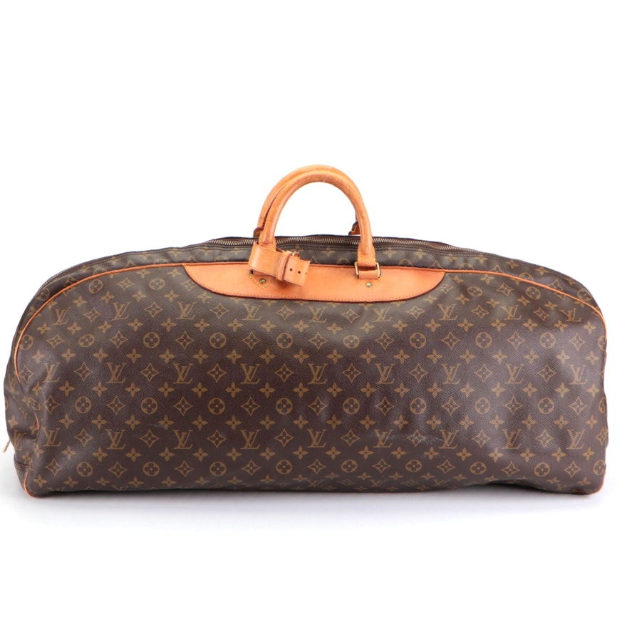 Louis Vuitton Alize One Poche Travel Bag in Monogram Canvas and Vachetta Leather