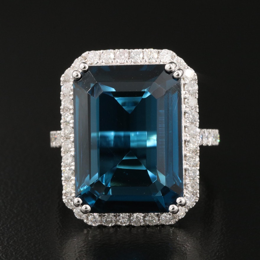 14K 21.18 CT London Blue Topaz and 1.06 CTW Diamond Halo Ring