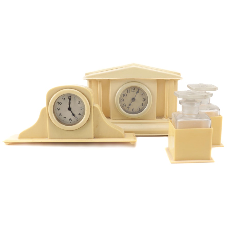 Ivoris and Other Celluloid  Desk Clocks with Glass and Celluloid Vanity Bottles