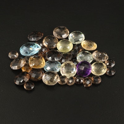 Loose 85.26 CTW Gemstones Including Swiss Blue Topaz, Amethyst and Smoky Quartz