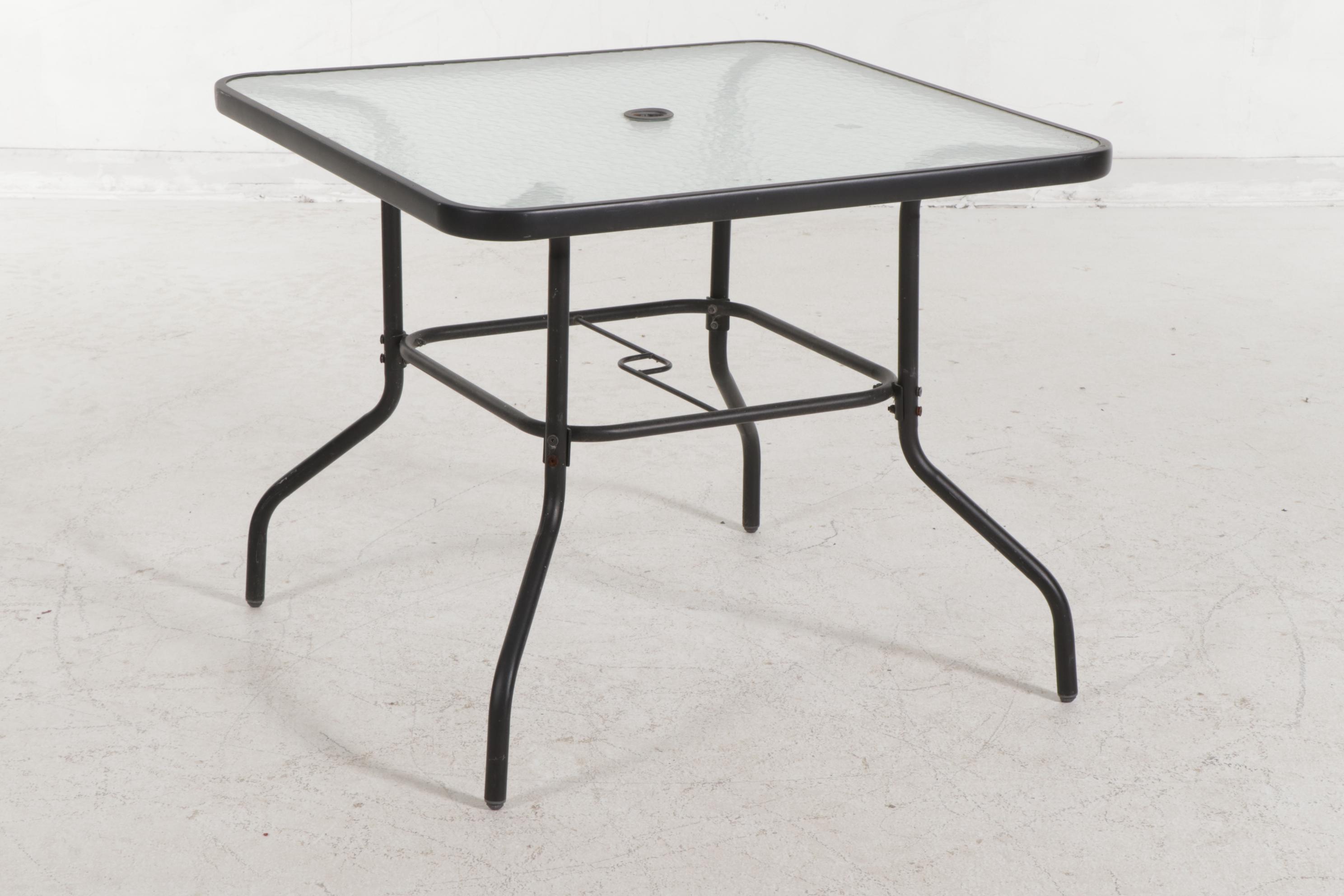 Metal Frame Patio Table and Four Folding Chairs EBTH