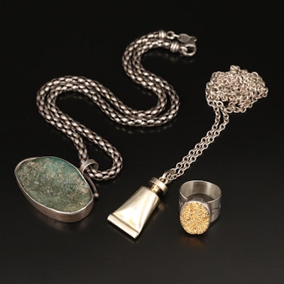 Desert Rose Trading, Roman Glass Pendant and Sterling Featured in Jewelry