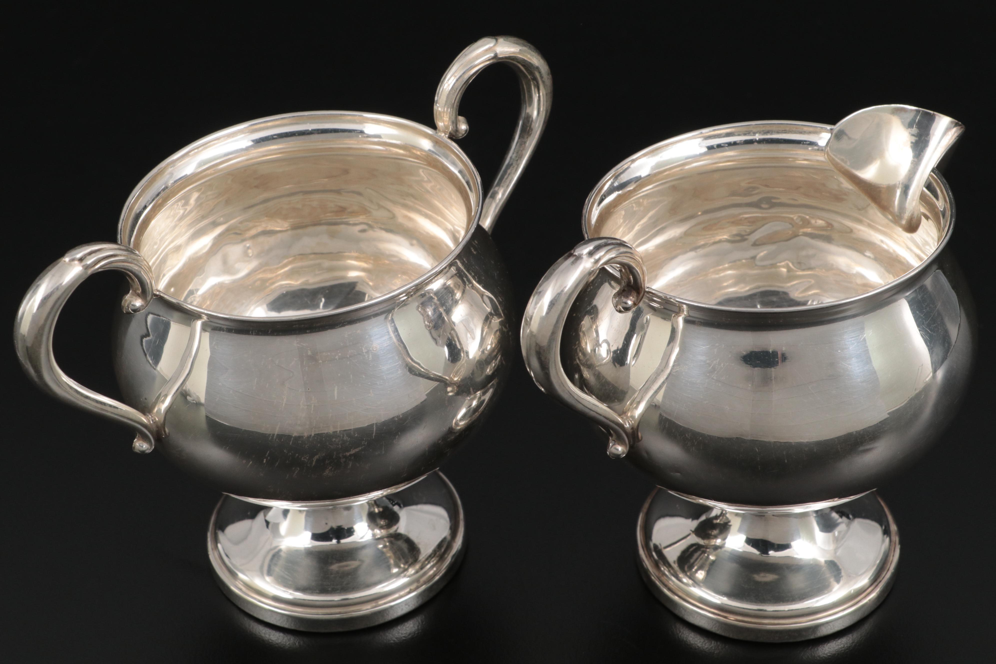 Fisher Silversmiths Creamer and Sugar with Silver Plate Tea Strainers