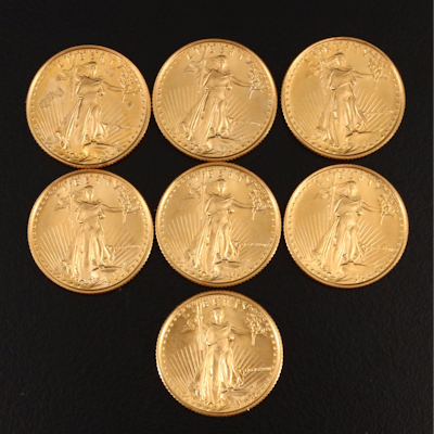 Seven 1986 1/10 .ozt $5 Gold Eagle Coins