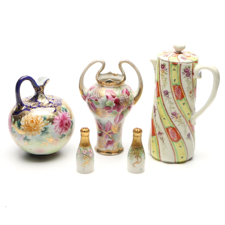 Japanese Porcelain Moriage Accented Vases and Chocolate Pot with Other Shakers