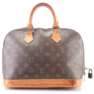 Louis Vuitton Alma Handbag PM in Monogram Canvas and Vachetta Leather