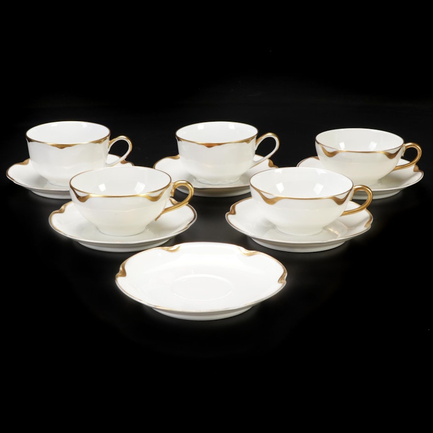 Haviland & Co. and Hutschenreuther Gilt Rimmed Porcelain Teacups and Saucers
