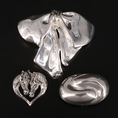 Sterling Pendants Including Horse, Bow and Freeform