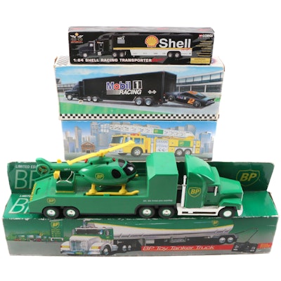Corgi, Mobil and BP Toy Semi Trucks, Fire Truck, and Helicopter