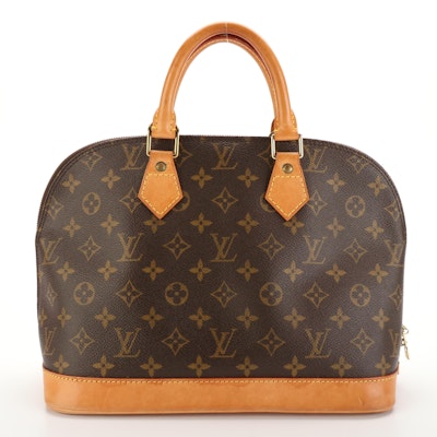 Louis Vuitton Alma PM Handbag in Monogram Canvas and Vachetta Leather