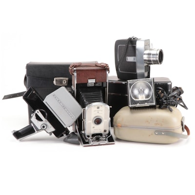 Bolex Paillard with Bell Howell Movie Cameras and Polaroid "95A" Land Camera