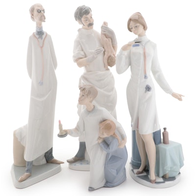 Lladró "Female Physician" with other Porcelain Figurines