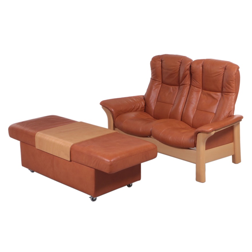 Ekornes "Stressless" Leather High-Back Reclining Loveseat and Ottoman Table