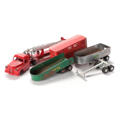 Structo Painted Metal Toy Fire Engine with Other Metal Trailers