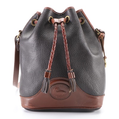 Dooney & Bourke Black and Brown All-Weather Leather Drawstring Tassel Bag