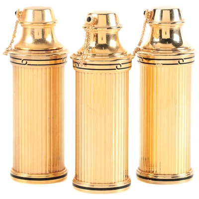 "Must de Cartier" and Other Gilt Metal Refillable Spray Purse Perfumes