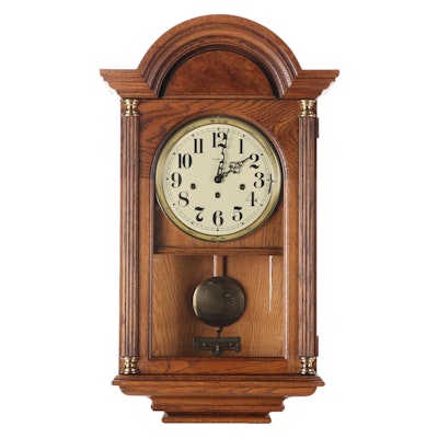 Howard Miller and Franz Hermle Walnut and Burl Triple Chime Wall Clock