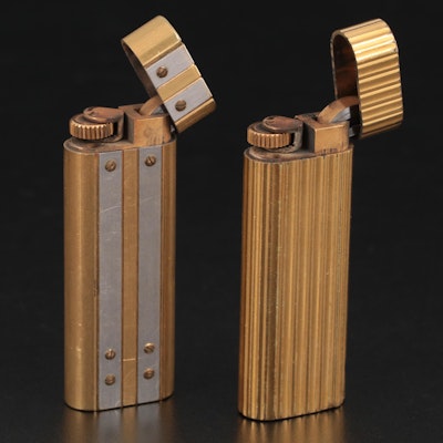 Cartier Swiss Made Gold Plated Oval Lighters, 20th Century