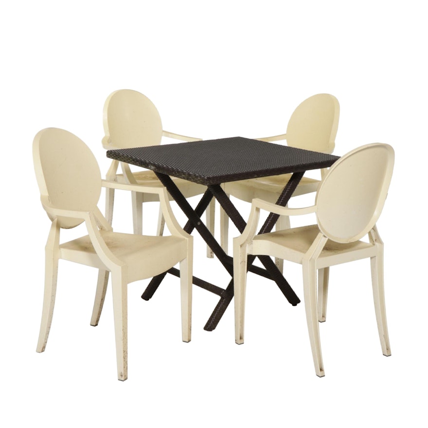 Four Louis Ghost S+ARCK by Kartell Plastic Chairs with PE Rattan Folding Table