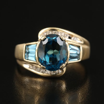 14K Swiss and London Blue Topaz Ring with Bypassing Diamonds