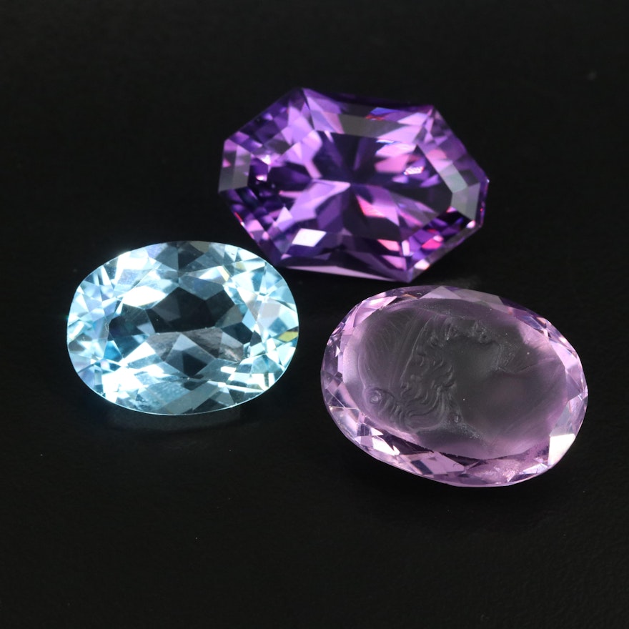 Loose 64.70 CTW Faceted Swiss Blue Topaz and Amethysts
