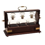 Italian Brass Mounted Walnut Wood Tantalus with Pressed Glass Decanters