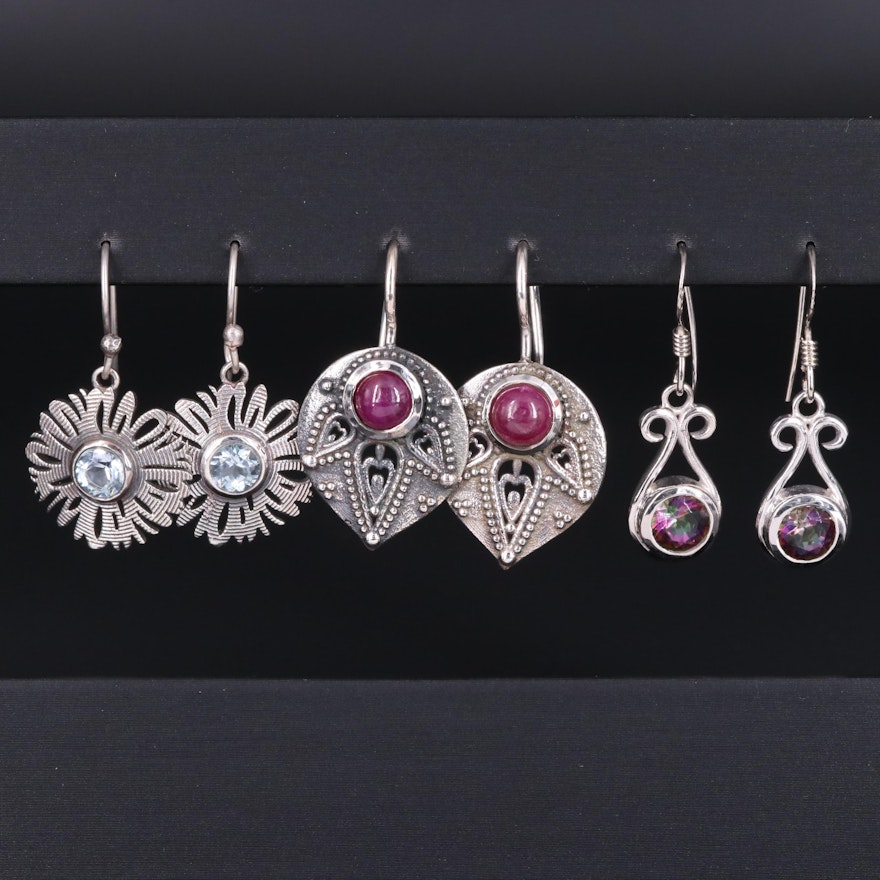 Assortment of Sterling Silver Earrings Including Ruby and Topaz