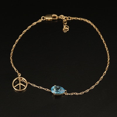 Sterling Swiss Blue Topaz and Peace Charm Bracelet.